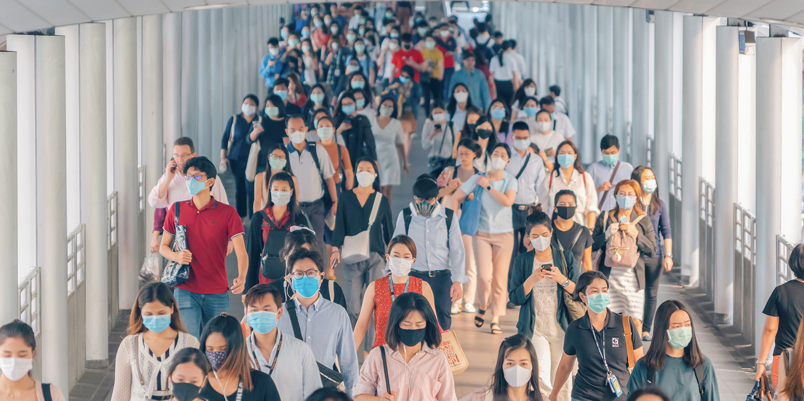 Menschen mit Masken in Asien
