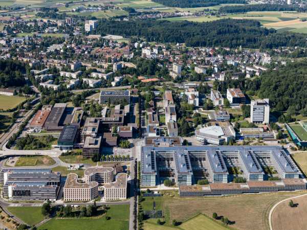 2017: The H?nggerberg campus with the two student residences (HWO, HWW), the Fnffinger Dock (HCI), and the office and HCP seminar building in the foreground. (Photograph: ETH Zurich / Alessandro Della Bella)