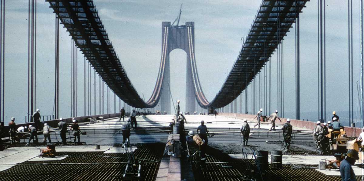 The Verrazzano-​Narrows Bridge during construction in 1964.